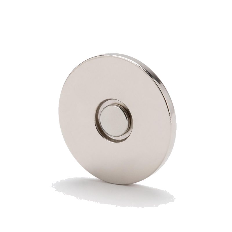 reverse of a die-cast golf ball marker showing the recessed neodymium magnet